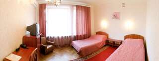 Отель Отель Жовтневый Днепр Улучшенный двухместный номер с 2 отдельными кроватями-1